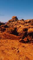 A dirt field with rocks in the middle of it video