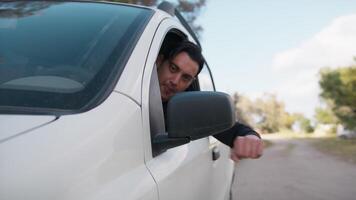 Boy In White Car Looks Out Of Window And Exults Smiling video