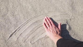 Hand Caresses The Smooth And Fine Beach video