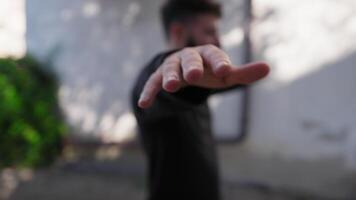 Man Waves Open Hands For Balance Exercise video