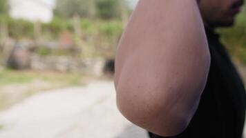 Elbow Of A Man While Doing Gymnastic Tricks In The Park video