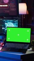 Vertical Hacker using isolated screen laptop and AI technology to deploy malware on unsecured devices. Scammer stealing sensitive data from unaware users using mockup notebook, camera A video