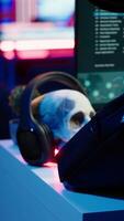 Vertical Hacker arriving in underground HQ with laptop in suitcase, ready to start coding malware. Cybercriminal opening notebook to exploit network backdoors and bypass security measures, close up, camera A video