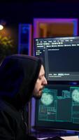 Vertical Hacker happy after successfully penetrating firewalls using malware, seeing access granted notification. Rogue programmer successfully gaining access to victim data, camera B video