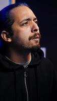 Vertical Hacker using AI machine learning to find unpatched connections and steal data. Close up shot of scammer using artificial intelligence to compromise digital devices and illegally gaining info, camera B video
