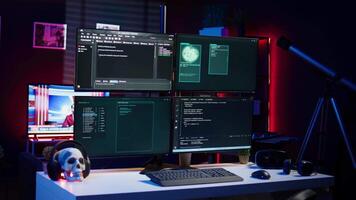 Script running on computer in secret base of operations used by hacker to steal data. Programming language on screen in empty room used by cybercriminal, attacking firewalls video