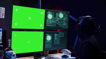 Hacker receiving access denied error message on chroma key monitors while doing corporate espionage. Scammer failing to steal information on competitor products using green screen PC, camera B video