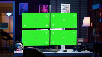 Hacker using isolated screen multi monitor PC setup, doing computer sabotage using ransomware. Cybercriminal walking with laptop, breaching firewalls in apartment with mockup displays, camera A video