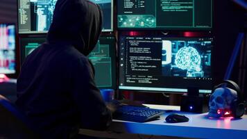 Evil cybercriminal using AI deep learning to produce virus corrupting data. Rogue programmer working on PC using artificial intelligence technology, penetrating security systems, camera A video