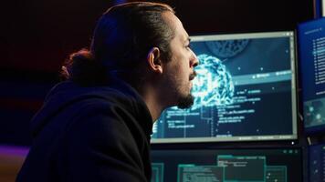 Hacker using AI machine learning to find unpatched connections and steal data. Close up shot of scammer using artificial intelligence to compromise digital devices and illegally gaining info, camera A video