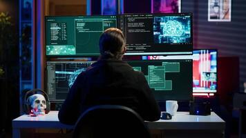 Rogue IT engineer uses AI deep learning to develop zero day exploit undetectable by antivirus. Hacker uses artificial intelligence computerized model to build script doing data mining, camera A video