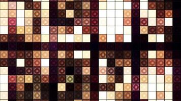 Shiny yellow geometric shapes. Motion. Small squares in orange color shine and shimmer in abstraction. video