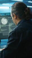 Vertical System administrator in server room frightened by sensitive data threatened by hacking attack on computers. Afraid man jumping out of desk chair, rushing to save data center from unauthorized access video