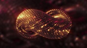 A swirling geometric shape of an orange hue. Motion. A loop made of shiny little particles in abstraction. video