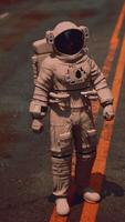 lone astronaut in a space suit is in the middle of a bustling metropolis video