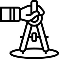 A hand holding a compass on a tripod vector