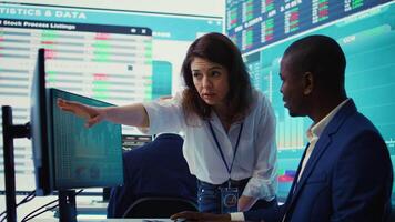 Project manager ensuring productivity and efficiency in creating annual reports, providing guidance for her staff in order to impress the shareholders. Strategic business objectives. Camera B. video
