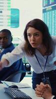 Vertical Irritated angry team leader screaming at her coworker after he failed to calculate expenditures, showing her disappointment in front of everyone. Furious dissatisfied business manager. Camera B. video