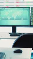 Vertical Empty work cubicles inside the enterprise headquarters office, business organization dealing with project planning and global expansion. Big data presented on a screen in coworking space. Camera A. video