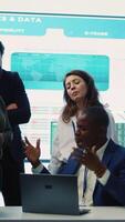 Vertical Displeased project manager sharing the failure with his team, employees feeling disappointed and frustrated about unsuccessful partnership. Furious CEO and dissatisfied associates. Camera A. video