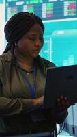 Vertical Business analyst looking into statistics and reports to detect any obstacles within the project structure, preparing solutions to ensure productivity. Manager studies numbers. Camera A. video