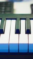 Vertical Electronic piano keyboard with mixing console at home studio used for producing tunes and soundtracks, acoustical engineering devices for music production. Empty desk with synthesizer device. video