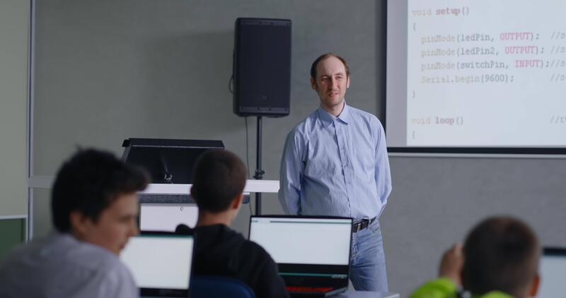 Teacher Of Computer Science And Programming Speaking In Classroom ...