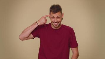 You are crazy, out of mind, man pointing at camera and showing stupid gesture, blaming some idiot video
