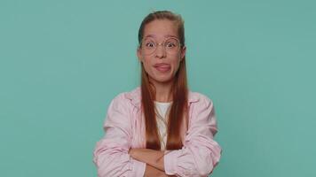 Girl showing tongue making faces at camera, fooling around, joking, aping with silly face, teasing video