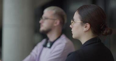 A diverse group of entrepreneurs engages in a dynamic business meeting within a modern office, showcasing their collaborative spirit and innovative approach to business development video