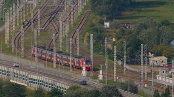 SOCHI, RUSSIA - AUGUST 01, 2022. High-speed train on the railway station of Sochi. Top view of the railway tracks electric train LASTOCHKA video