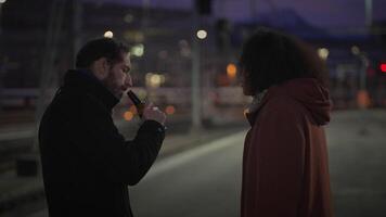A nighttime encounter unfolds in a vibrant urban setting filled with captivating elements video