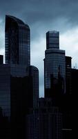 Skyscrapers rise dramatically against the stormy sky, creating a striking visual display video