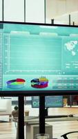 Vertical Empty modern office setup with advanced technology enhances productivity, helping professionals focus on financial strategies, performance metrics and global business objectives. video