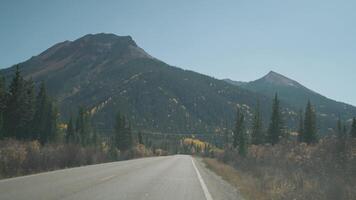 POV Driving Car at Million Dollar Highway during fall season from Ouray to Silverton in southwestern Colorado Offering breathtaking mountain, valley and gorge views video