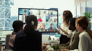 Executive board members discussing with shareholders on online videocall, attending a remote briefing meeting to ensure project success and development. Organizational analysis. Camera B. video