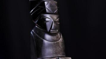 Obsidian Aztec Totem Statue Figurine Rotating on Black Background Turntable video