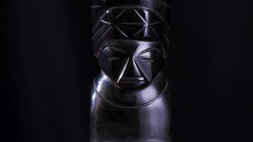 Obsidian Aztec Totem Statue Figurine Rotating on Black Background Turntable video