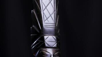 Obsidian Aztec Totem Statue Figurine Rotating on Black Background Turntable video
