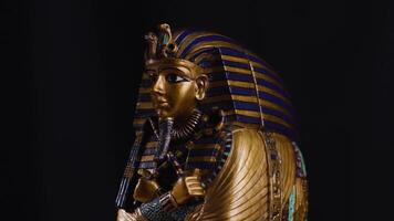 Egyptian King Tutankhamun Statue Figurine Rotating on Turntable Historic Display video