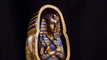 Egyptian King Tutankhamun Statue Figurine Rotating on Turntable Historic Display video
