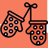 A pair of mittens with polka dots on them vector