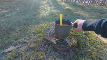 Camp Food. Cooking in a Hike Using a Small Cook Set - First Person View, Wide Angle. Food on the Trip. Traveler in a Spring Forest. Tourist in a Travel is Heating Food - POV Shot. video
