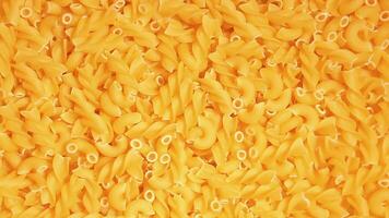 Uncooked Fusilli and Chifferi Rigati Pasta - Top View. Fat and Unhealthy Food. Classic Dry Macaroni, Slowly Rotating Background. Raw Different Macaroni Pasta Texture - Rotate Left video