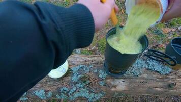 Camp Food. Cooking in a Hike Using a Small Cook Set - First Person View, Wide Angle. Food on the Trip. Traveler in a Spring Forest. Tourist in a Travel is Heating Food - POV Shot. video