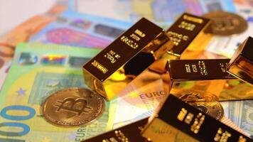 Fine Gold Bars with Bitcoin Coins on the Different Euro Banknotes Rotating. Euro Currency. Colored Paper Money. A Lot of Euro Cash. Income, Earnings, Cryptocurrency, Money Saving and Wealth Concept video