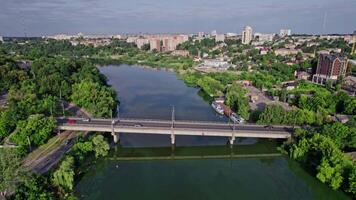 Panoramic view of small city near river with bridge video