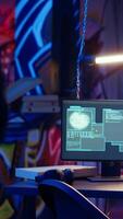Vertical Hacker arriving with tablet in hidden base, deploying viruses on unaware victims computers, stealing sensitive and private information, selling it on darknet black market to highest bidder, camera B video