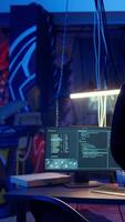 Vertical Hacker coming in secret base to use bugs and exploits to break into computer systems and access valuable data, bypassing firewalls, panning shot. Cybercriminal arriving in underground bunker video