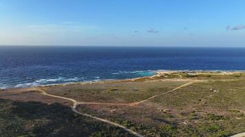 Aerial view around the eastern tip of the Caribbean island of Aruba video
